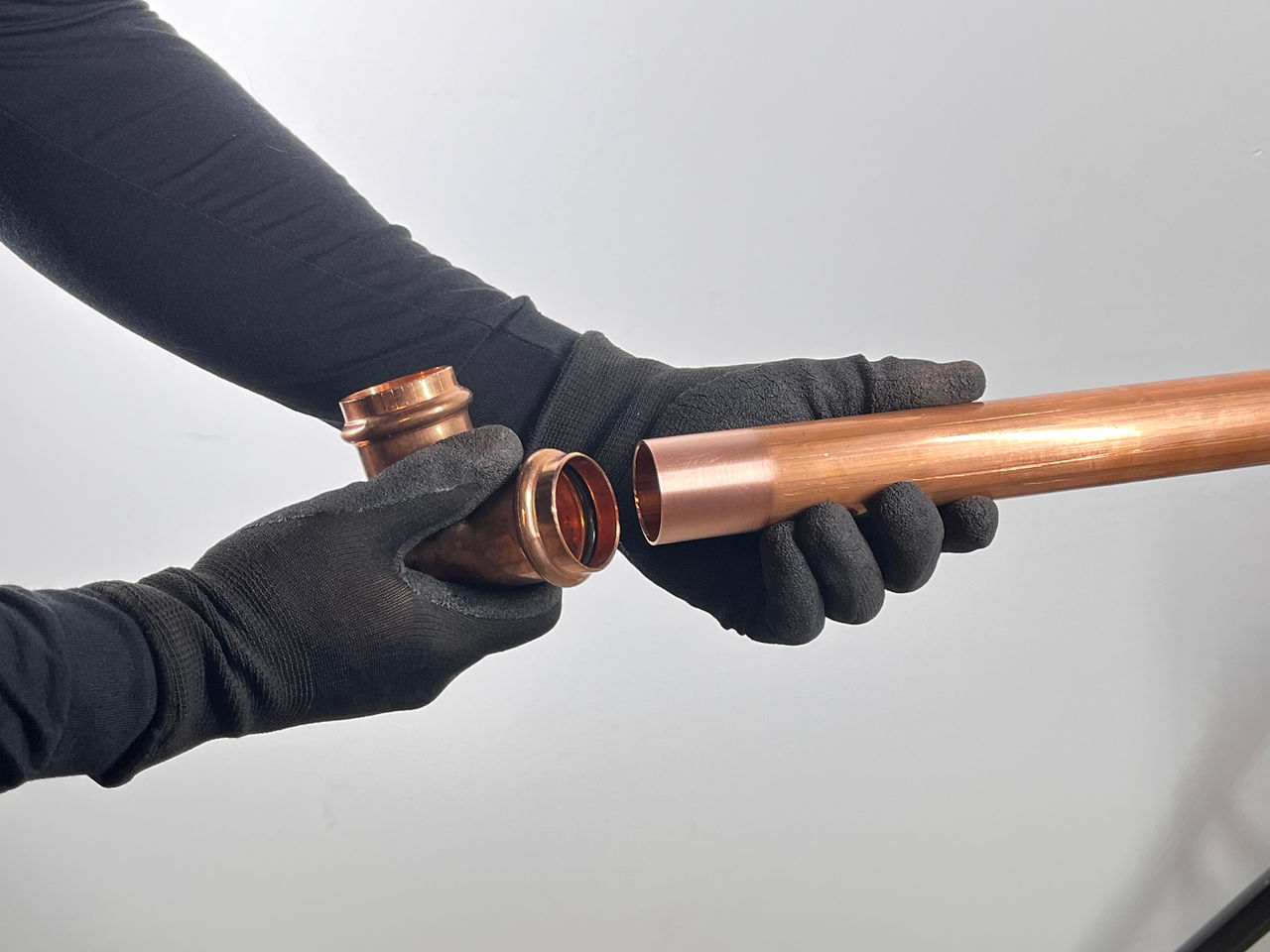 Still Image of a ProPress fitting going into a copper pipe