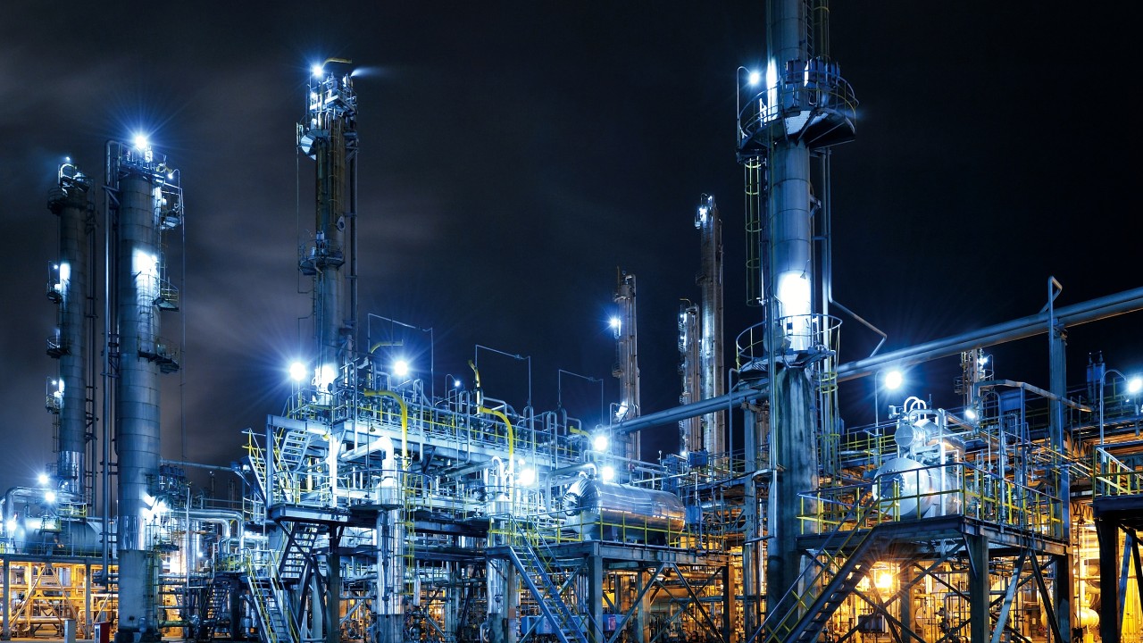 Oil Refinery, Chemical & Petrochemical plant abstract at night.