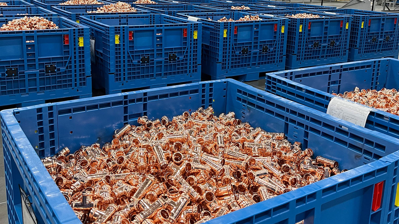 Blue bin full of ProPress fittings